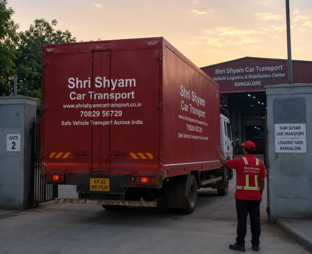 Car carrier truck reversing into loading yard at dawn | Shri Shyam Car Transport