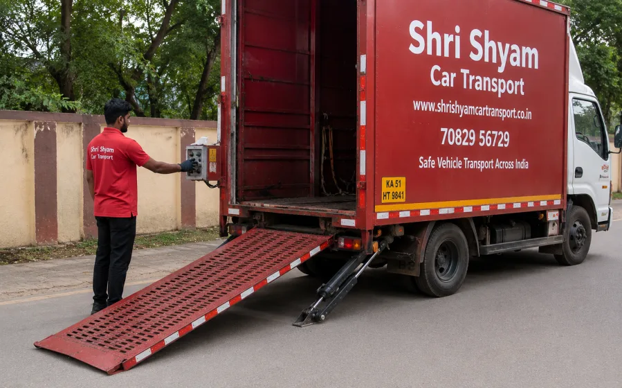 Hydraulic ramp lowered from a closed car carrier | Shri Shyam Car Transport